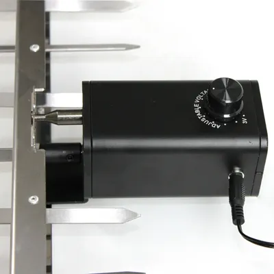 Close-up of a rotisserie motor and spit assembly.