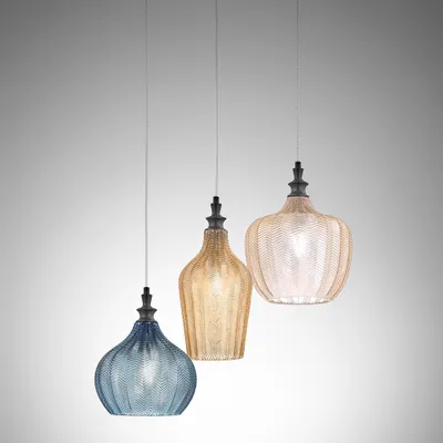 Three pendant lights of different colors hanging against a gradient background.