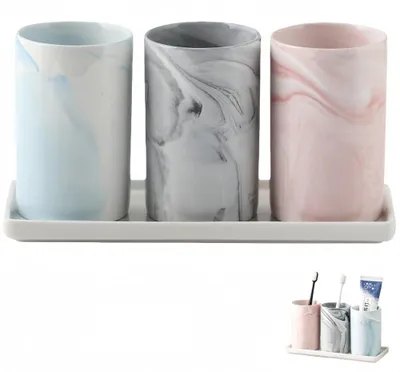Produktbild von Omgoods – Set aus Zahnbürstenhaltern aus Marmor mit Ablagefläche – Rosa, Blau, Grau