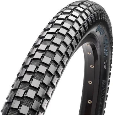 A close-up studio shot of a bicycle tire against a white background.