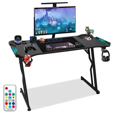 Produktbild von Jopassy Gaming Schreibtisch Z-Form 140x60cm Gaming Tisch ergonomischer, Carbon Tischplatte, Becherhalter, Kopfhörerhaken, Mauspad - met LED+Fernbedienun