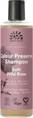 A bottle of URTEKRAM Colour Preserve Shampoo with Wild Rose.