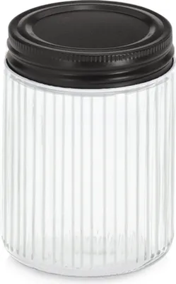 A clear studio shot of a glass jar with a black metal lid.