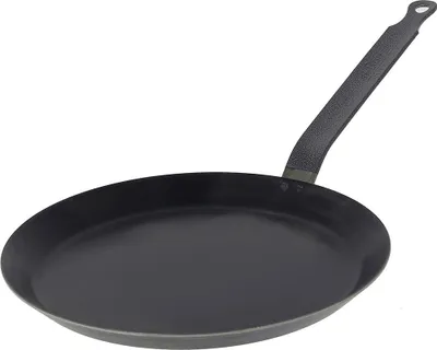 A black crepe pan on a white background.