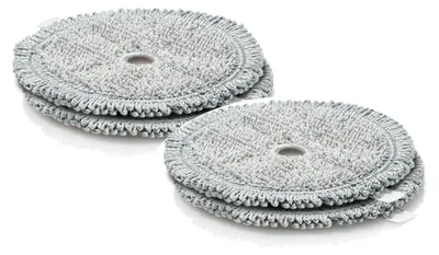 Two stacks of round, gray cleaning pads with a hole in the center, arranged on a white background.