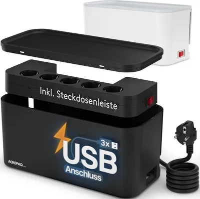 A black cable management box with a detachable power strip and lid, shown with a white appliance in the background.
