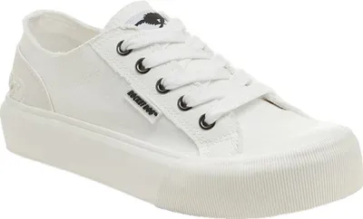 A white canvas sneaker with a thick white sole.