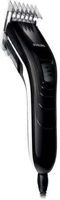 A black and silver electric hair clipper is shown against a white background.