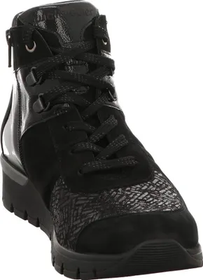 A black bootie with laces and a zipper.