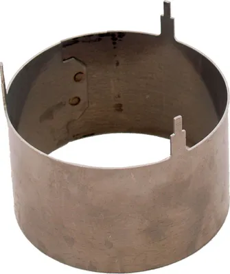 A metal ring with tabs, likely a component for a stove or appliance.
