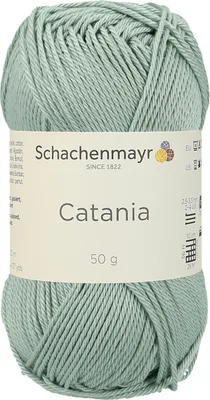A ball of green yarn with a label.