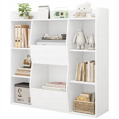 A white bookshelf filled with books and decorative items.