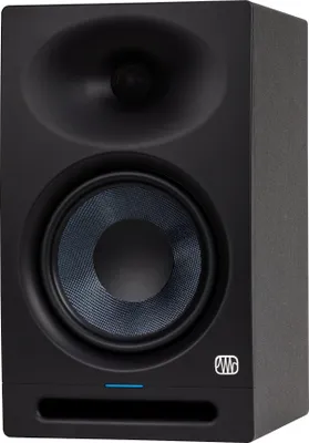 A black studio monitor speaker with a blue woofer and a silver logo on the front.