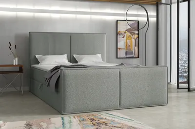 A bedroom setting with a bed as the main focus.