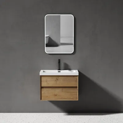 A modern bathroom vanity with a sink and faucet mounted on a gray wall.