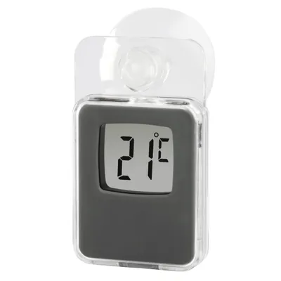 A digital thermometer with a suction cup for mounting.