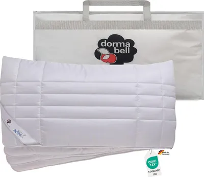 A white pillow is shown in front of a white carrying bag with the Dorma bell logo.