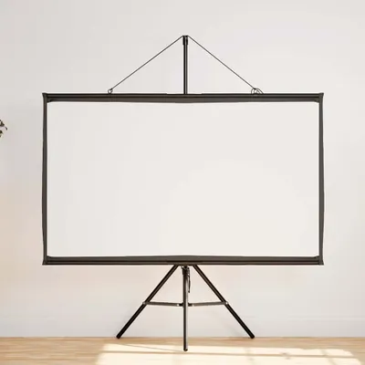 A white projection screen on a tripod stand against a white wall.