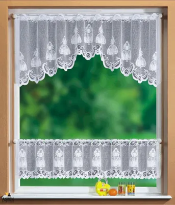 A window with white lace curtains and a blurred green background.