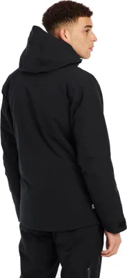 A man wearing a black ski jacket and pants, shown from the back.