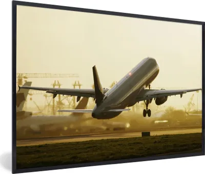 Produktbild von MuchoWow® MuchoWow® Gerahmtes Poster Ein Flugzeug, das von einer Startbahn abhebt 60x40 cm - Poster mit zchwarzem Bilderrahmen - Printing - Wanddeko Schlafzimmer