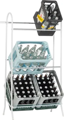 A white metal shelving unit holding several crates of beverages.