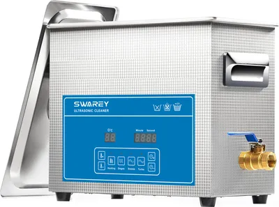 A stainless steel ultrasonic cleaner with a blue control panel.