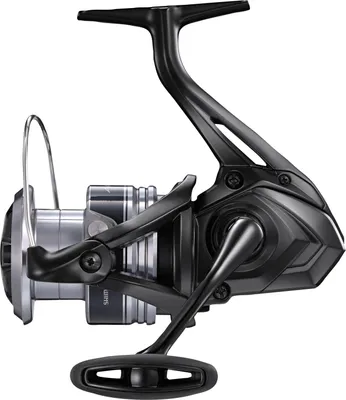 A studio shot of a fishing reel against a white background.