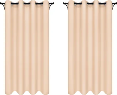 Two beige curtains hanging from a curtain rod.