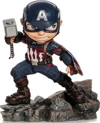 A figurine of Captain America holding Mjolnir, standing on a rocky base.