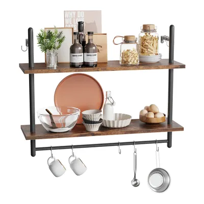 A two-tiered industrial-style shelf unit with kitchenware and decorative items.