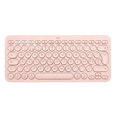 A top-down view of a pink Logitech K380 Bluetooth keyboard.