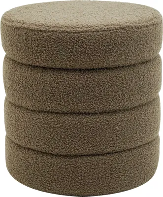 A stack of four round, textured ottomans or storage stools.