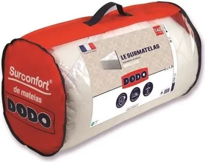 A mattress topper is shown in its packaging, which is a red and clear plastic bag with a handle.