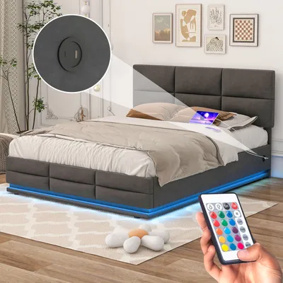 A bed with LED lights and a remote control is shown.
