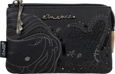 A close-up studio shot of a navy blue Anekke coin purse with intricate embellishments.
