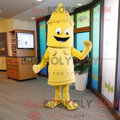 Obrázok produktu pre Maskot spoločnosti REDBROKOLY je postava citrónovo žltej lasagne, oblečená v roláku a s odznakom na klobúku