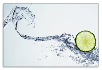 Produktbild von Wallario Frühstücksbrettchen aus Glas 20 x 30 cm mit rutschfesten Füßen, Motiv Limettenscheibe in spritzigem Wasser
