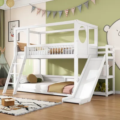 A children's bedroom with a white bunk bed featuring a slide and ladder, decorated with colorful bunting and a large bear illustration on the wall.