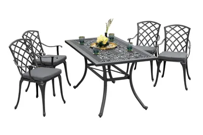 A dining set with a table and four chairs, set against a white background.