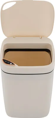 A white automatic trash can with a gold-colored interior and a control panel on the front.