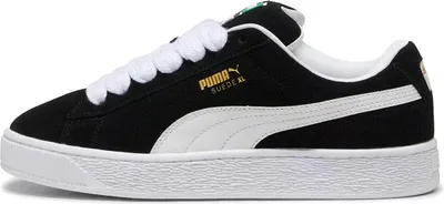 A single Puma sneaker is shown from the side against a white background.
