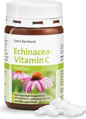 A bottle of Sanct Bernhard Echinacea-Vitamin C lozenges with some lozenges spilled in front.