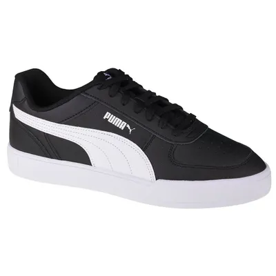 A single black Puma sneaker with white accents is shown against a white background.
