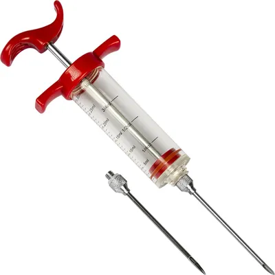 A meat injector syringe with two needles on a white background.