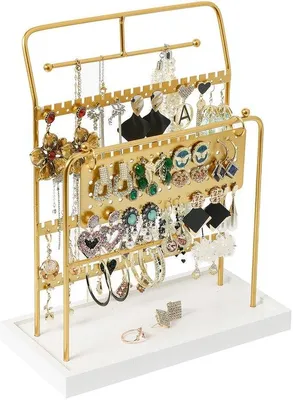 Immagine prodotto di Un portagioie Unyqoos® elegante, di colore oro, realizzato in metallo e dotato di un vassoio bianco in legno, con rivestimento resistente ai graffi, ideale per collane, orecchini, braccialetti e anelli