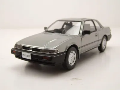 Produktbild von Whitebox 124258 Honda Prelude RHD 1985 grau metallic 1:24