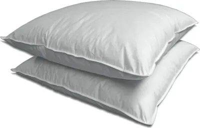 Two white pillows are stacked on top of each other against a white background.