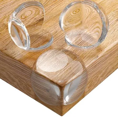 Image de Protège-coins transparents Unyqoos® en PVC de haute qualité – adhésifs, robustes, pour tables et meubles, sécurisés pour les enfants, incluent 3 bandes adhésives