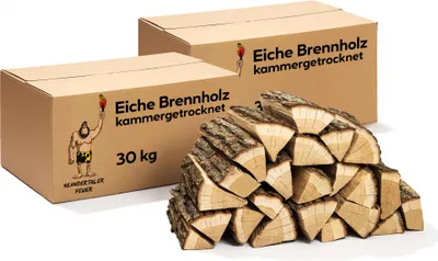 Two cardboard boxes of firewood are shown, with a pile of firewood in front of them.